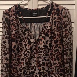 Bebe Leopard print top like new fits like M